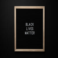 A sign that says Black Lives Matter